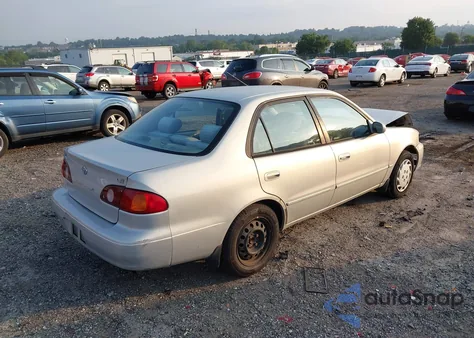 2002 Toyota Corolla Le из США, поврежденный, VIN 2T1BR12E22C583967
